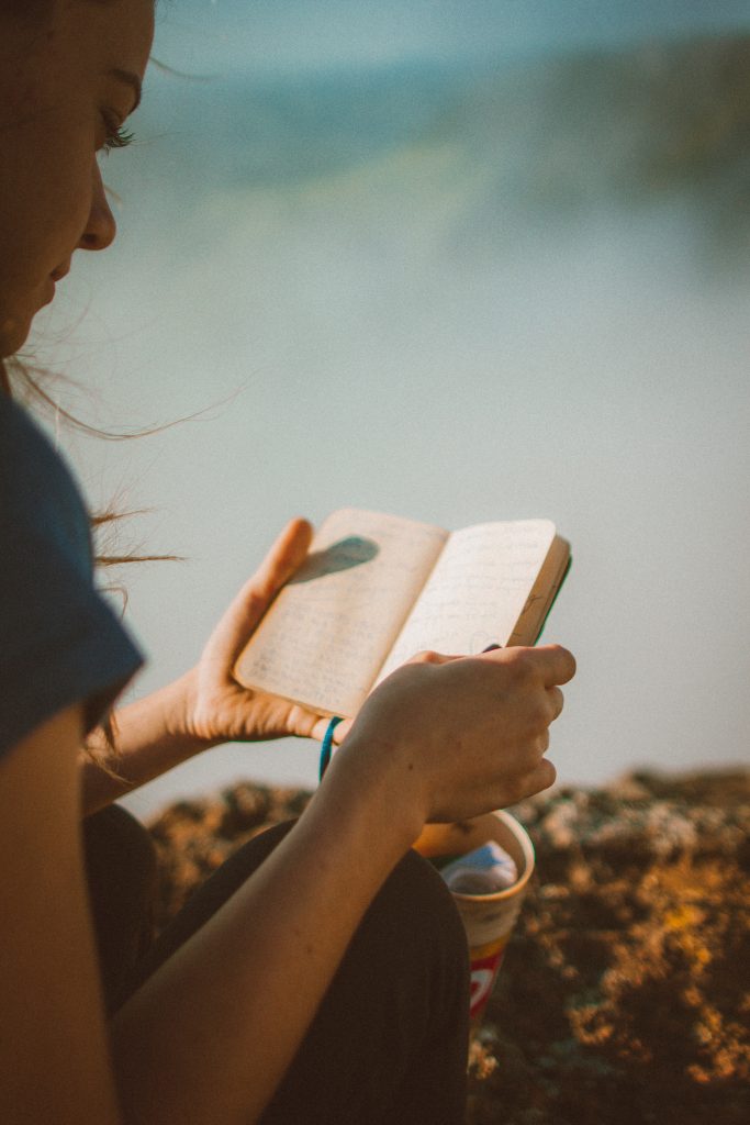 Woman reading her diary.