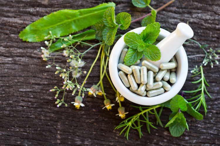 plants and herbs with capsules in