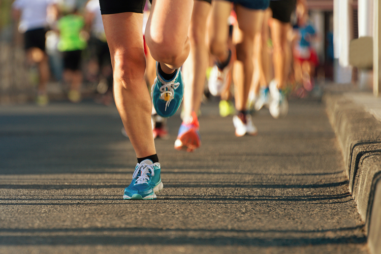 Marathon running in the light of evening.