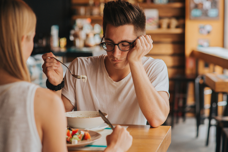 Portrait of woman with no appetite. she is tired and figuring out how to overcome an eating disorder. 