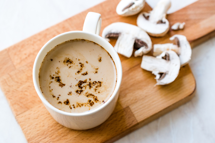 Mushroom Latte Coffee with Milk and Espresso on Wooden Board Ready to Drink.