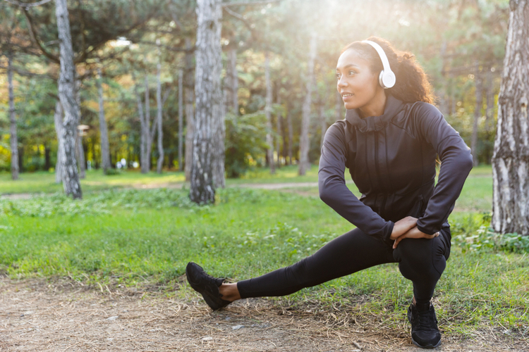 woman doing sports and stretching body