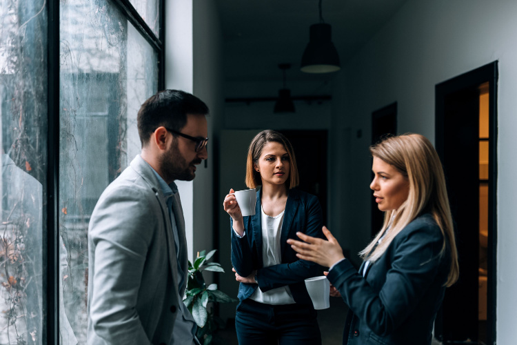 Business team drinking coffee