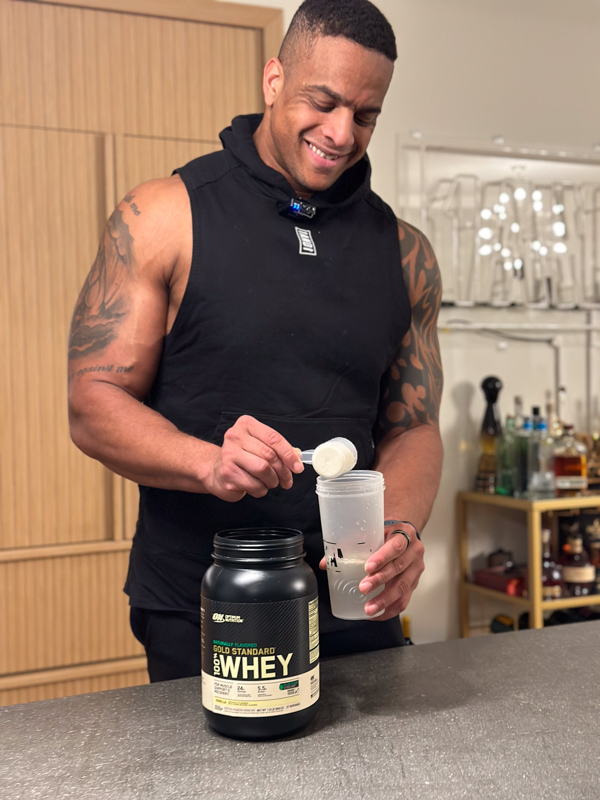 Corey tasting ON Gold Standard Whey Protein vanilla flavor